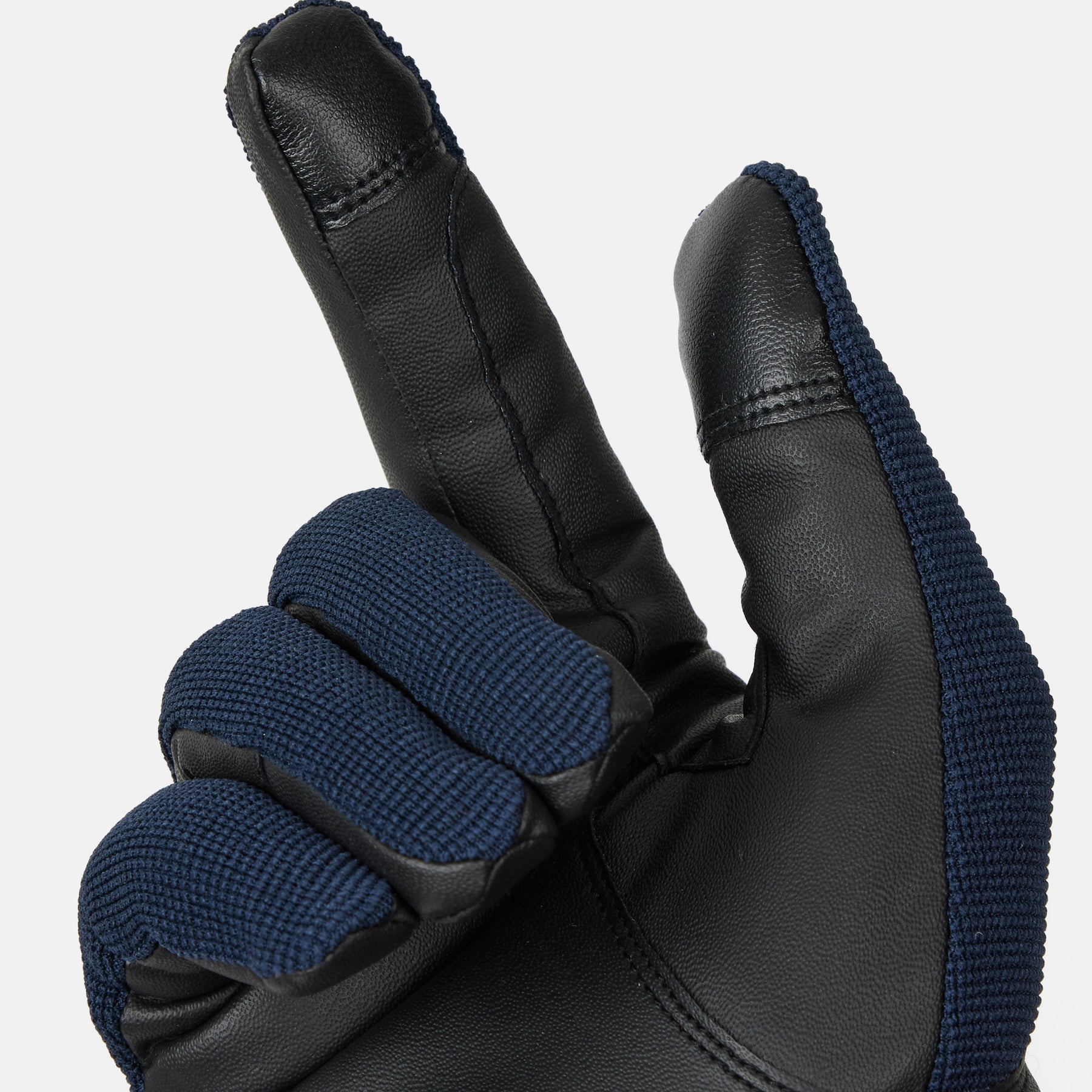 Palm view of a Seaborne Navy Horze Romy Winter Riding Glove on a plain background