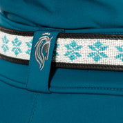 Close-up view of the Black/Glacier Blue Equinavia Estelle Hand Beaded Belt over petrol breeches