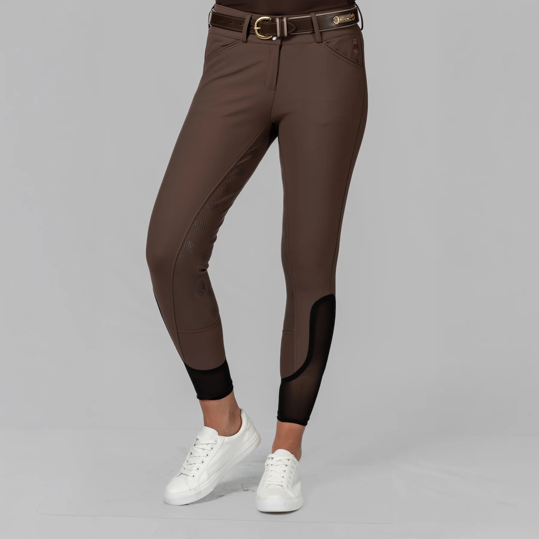 Front view of a model wearing the Dark Brown Equinavia Maud Tech Full Seat Breeches on a plain background